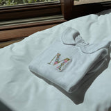 Mameluco con Letra de Flores Recién Nacido